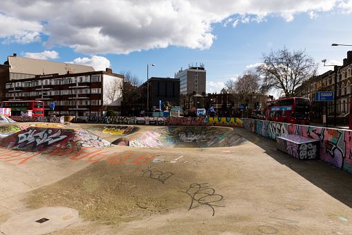 London, UK - Mar 14, 2019: The trendy Brixton neighborhood skate park late in the day,