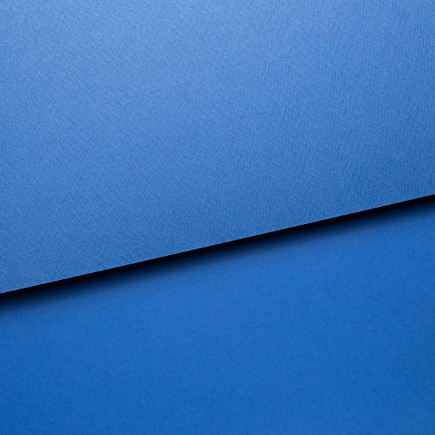 istock Abstract blue layered color paper background 1293702739