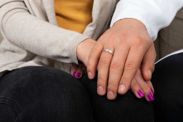 istock Doctor holding patients hands 1293708445