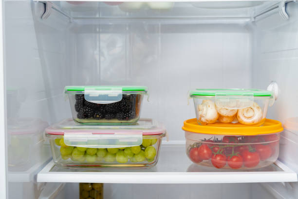 istock Storage containers with fresh food in a fridge 1293710878
