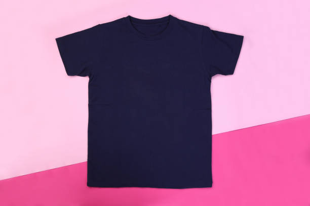 istock Front navy blue tshirt on pink pastel background 1293712519