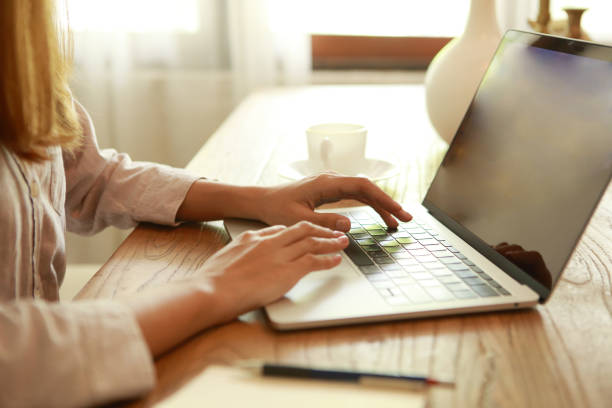 istock Business woman using laptop in cafe 1293712830