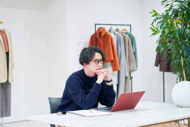 istock Asian fashion designer working at the office 1293721743