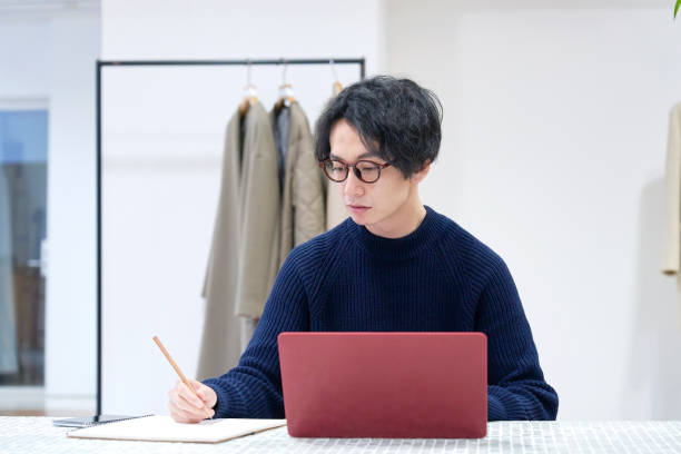 istock Asian fashion designer working at the office 1293721836