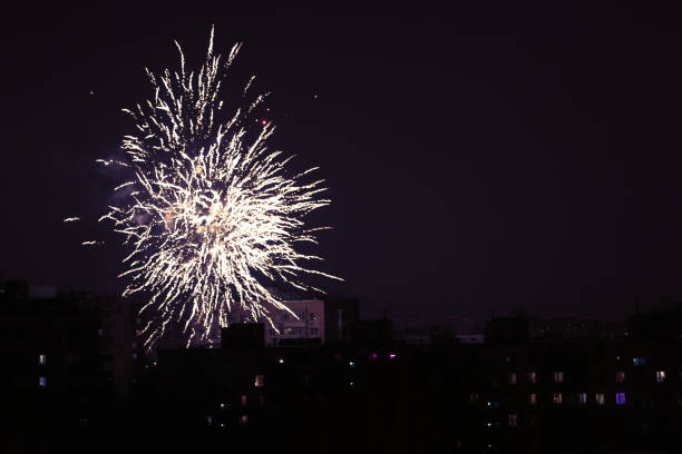 istock Small colourful festive fireworks above residental area 1293722857