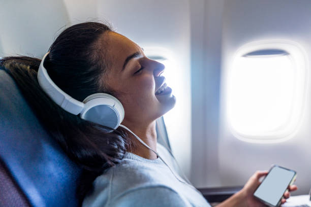istock Beautiful woman travel by plane 1293724739
