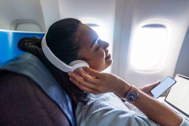 istock Beautiful woman travel by plane 1293724774