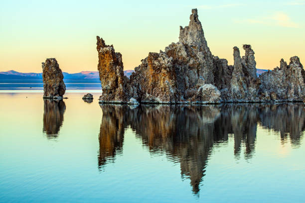 istock Reflections of tuff outliers in water 1293734417
