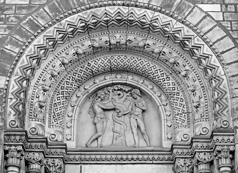 Prague - The relief of Adam and Eva (Paradise Lost) on the portal of the church kostel Svatého Cyrila Metodeje by Václav Levý (1867 - 1869).