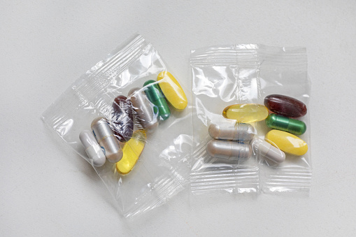 Vitamins Minerals and Supplements Pills in Bags