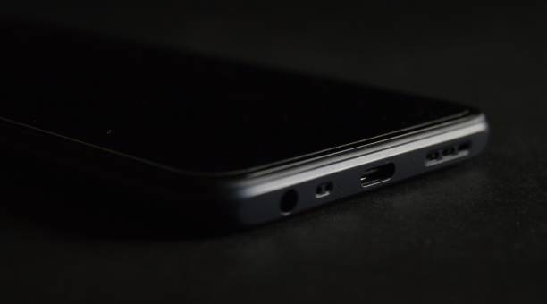 istock Mobile phone's charging port and speaker 1293741033