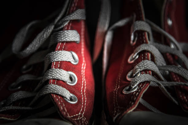 Red shoes Red shoes on the black background high tops stock pictures, royalty-free photos & images