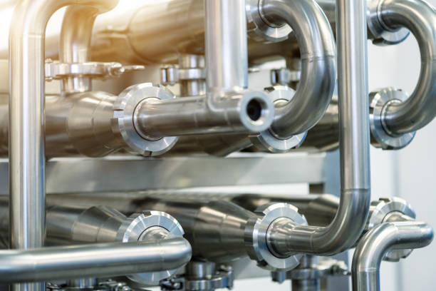 istock Industrial stainless steel piping connected by special nuts 1293743657