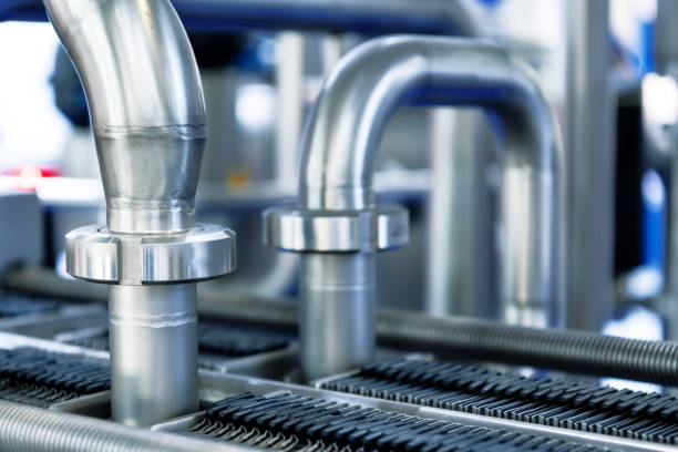 istock Industrial stainless steel piping connected by special nuts 1293744268