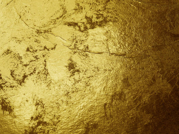 istock Grunge gold foil texture background with cracks and scratches 1293744271