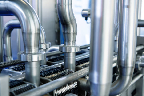istock Industrial stainless steel piping connected by special nuts 1293744632