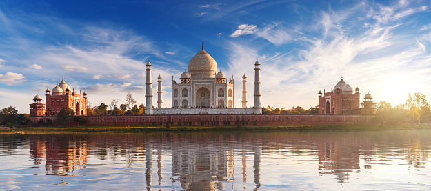 Taj Mahal at sunset and its reflection, place of visit in India, view from Mehtab Bagh, Agra, Uttar Pradesh.