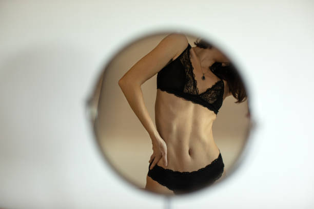 istock Sensual woman relaxing in her bedroom 1293746892