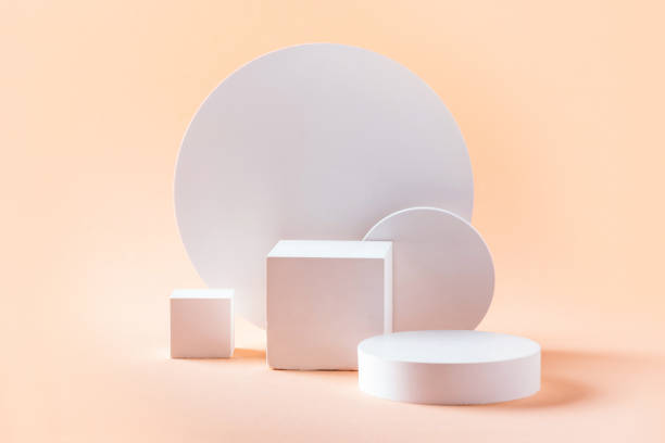 istock Abstract empty geometric shape podium for product on pastel beige background. Copy space. White cube on natural backdrop. Pedestal template for advertising. Trendy minimal concept. Mock up 1293749446