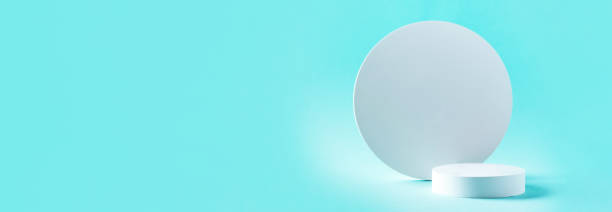 istock Abstract empty geometric shape podium for product on pastel blue background. Copy space. White cube on green backdrop. Pedestal template for advertising. Trendy minimal concept. Mock up 1293749455