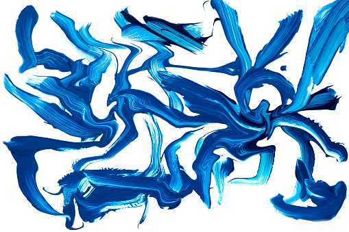 Close-up of abstract fluid acrylic wet paint background