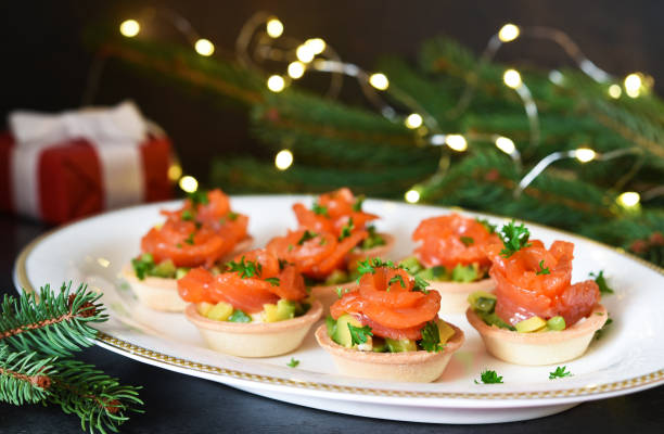 istock Snack with salmon and avocadon on New Year's table. 1293752357