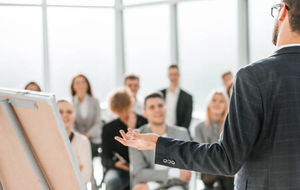 istock business man makes a report in the conference room 1293756939