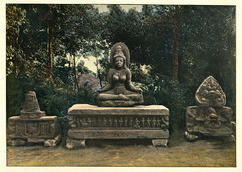 Vintage colourised photograph of Ancient Statue of the goddess Uma, Annam (Vietnam), Victorian 19th Century. Uma is one aspect of the Great Goddess of Indian mythology known as Devi