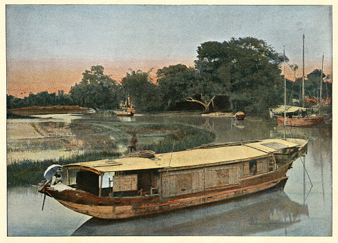 Vintage colourised photograph of River boat (Junk) of a Mandarin, Annam (Vietnam), Victorian 19th Century