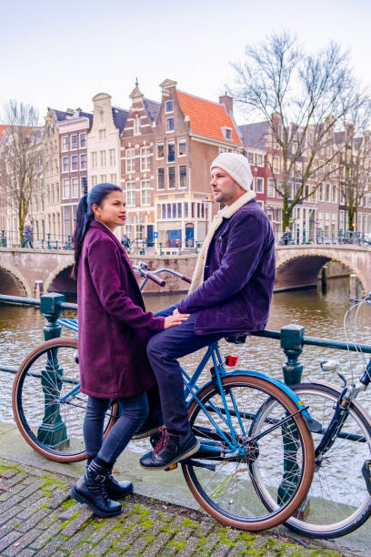 istock Amsterdam Netherlands during sunset, historical canals during sunset hours 1293763389