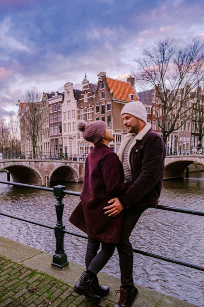 istock Amsterdam Netherlands during sunset, historical canals during sunset hours 1293763496