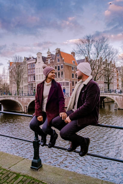 istock Amsterdam Netherlands during sunset, historical canals during sunset hours 1293763675