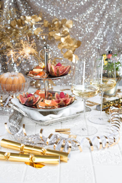 istock Festive Party Table with Seafood Appetizer Etagere Tower and Wine 1293764322