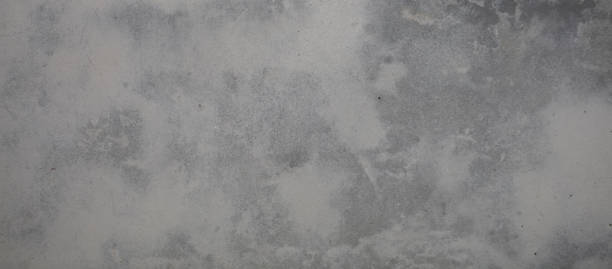 istock Texture of a gray concrete wall with white and gray veins. Grunge surface. 1293768385