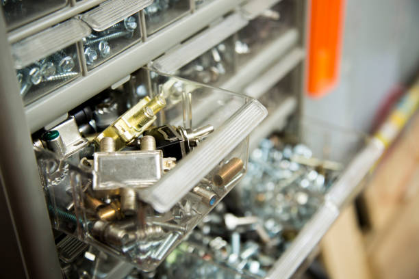 istock Small drawers in plastic case holding an assortment of items. 1293773714