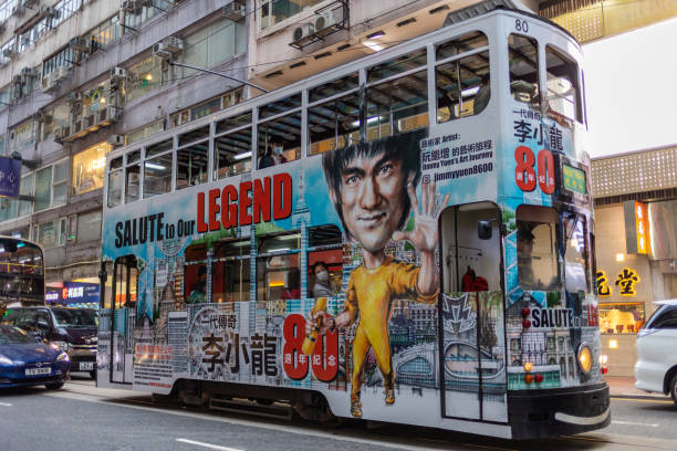 Double-decker tram move past Causeway Bay in Hong Kong. Hong Kong has the world's largest operating fleet of double-decker trams.