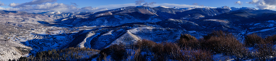 Vail Valley Colorado Winter View - Scenic view along the I-70 corridor between Edwards and Vail, Colorado USA. Including Avon, Colorado, Wildridge, Singletree, Bachelor Gulch, Beaver Creek, Cordillera. Fresh snow and sunny weather scenic mountain landscapes, ski resorts and scenic vistas.
