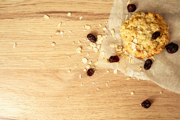 Cookies with raisins cozy in a blanket outside.