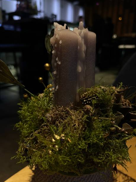 istock extinguished christmas candle on the table 1293782295