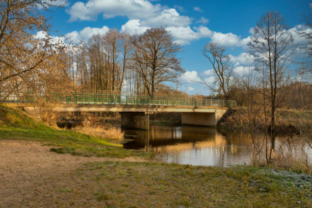 istock Road bridge, connecting two river banks. 1293785548
