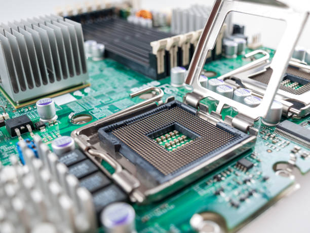 istock CPU connector on the circuit motherboard with pressure contacts for connecting a silicon microprocessor, CPU selection during computer assembly 1293787666