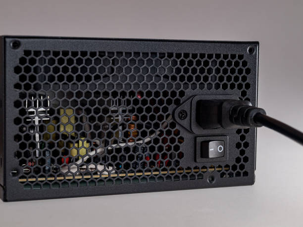 istock Computer part for system unit assembly, power supply for computer close-up, choice of quiet silent reliable power 1293787748