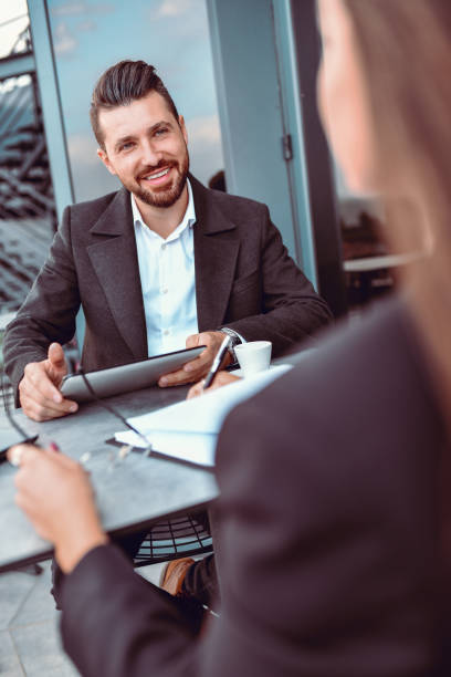 istock Job Interview In Progress By Male Businessman For Female Candidate 1293788607