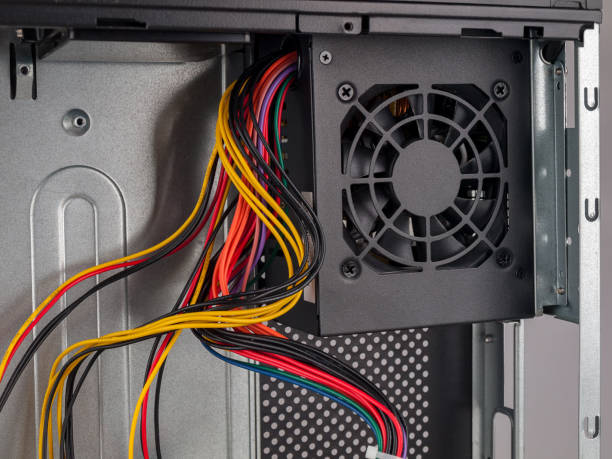 istock Computer part for system unit assembly, power supply for computer close-up, choice of quiet silent reliable power 1293788798