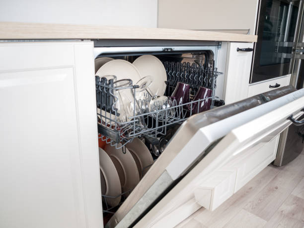 istock dishwasher close-up with washed dishes, easy to use and save water, eco-friendly, built-in kitchen dish washing machine 1293793149
