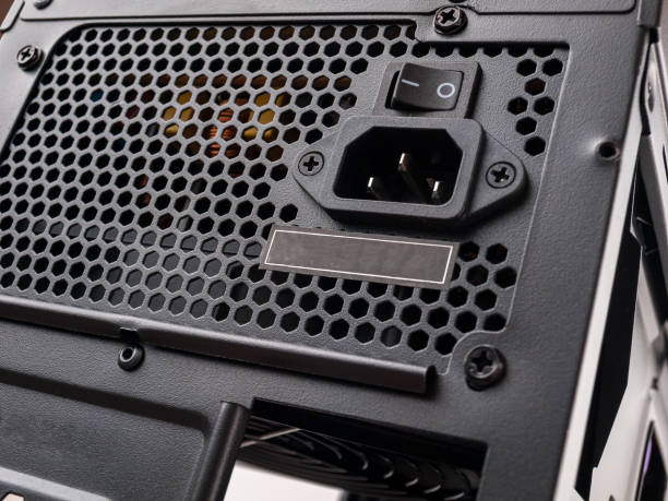 istock Computer part for system unit assembly, power supply for computer close-up, choice of quiet silent reliable power 1293793841