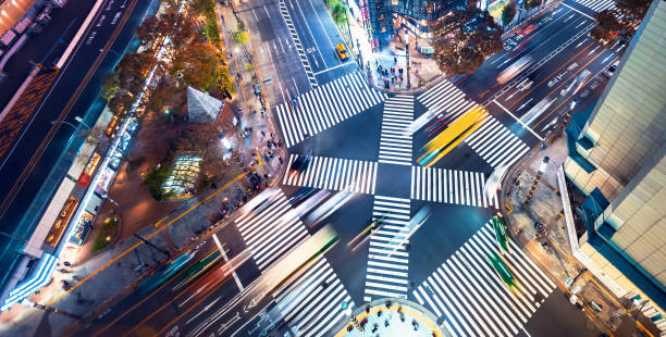 istock Traffic and people cross a busy intersection in Ginza 1293794970