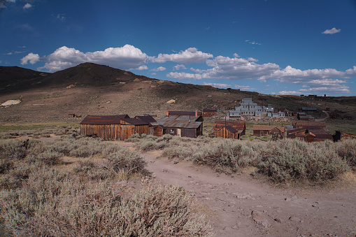 Shafter, Texas - USA, May 4, 2023. Shafter ghost town in west Texas, a brief silver mining boom town in the 1880s. Town sign and crumbling adobe structures.