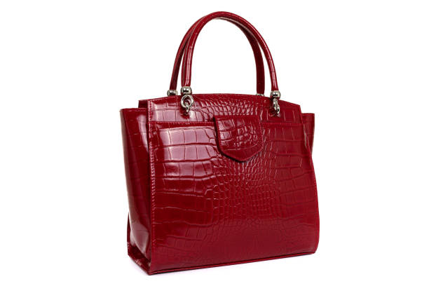 istock red stylish ladies leather bag on a white background 1293798395