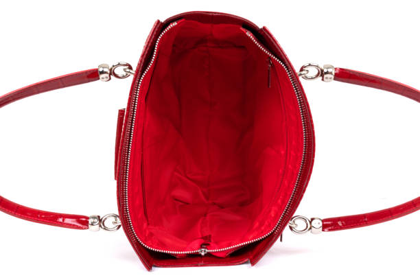 istock red stylish ladies leather bag on a white background, top view 1293798418